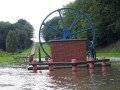 Mechanizm poruszający liny ciągnące wózki